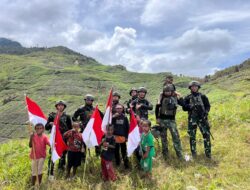 Memperingati Hari Juang Kartika TNI Angkatan Darat, Satgas Yonif 112/DJ Kibarkan Bendera Merah Putih Di Puncak Jaya